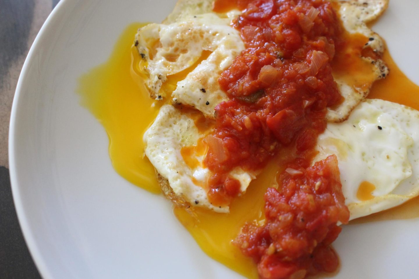 Over Easy Eggs with Spicy Tomato Sauce What's For Dinner Esq.